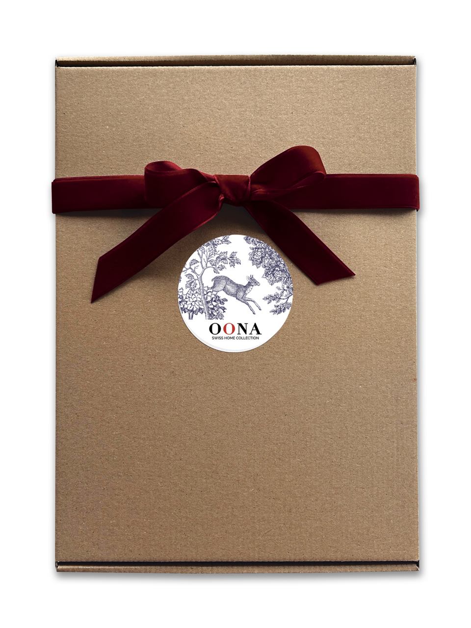 Boîte cadeau avec ruban rouge et étiquette